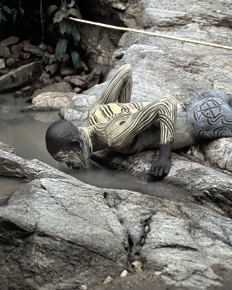 body painting, reclining drinker