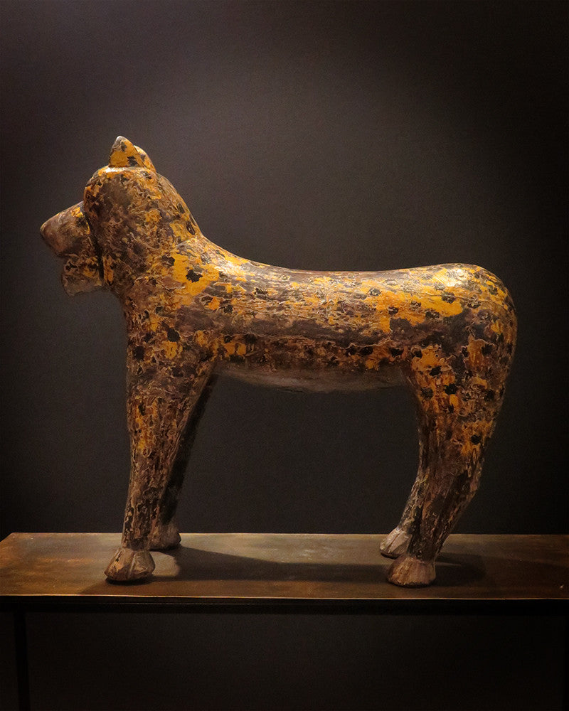 Wooden leopard statue