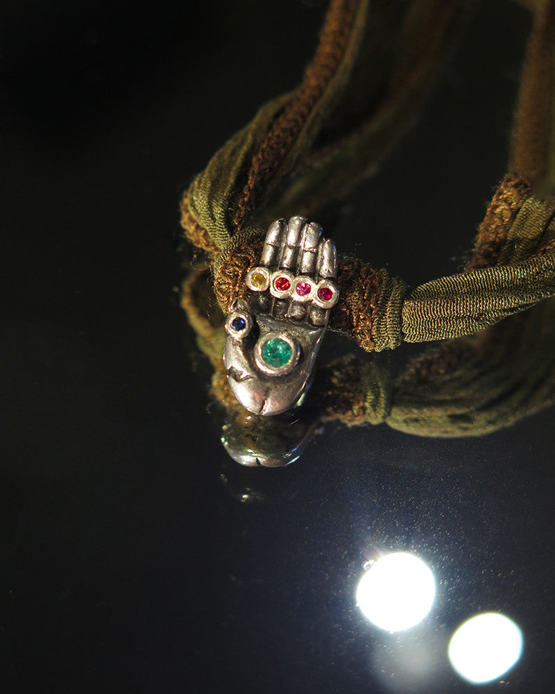 Charm La main de Buddha