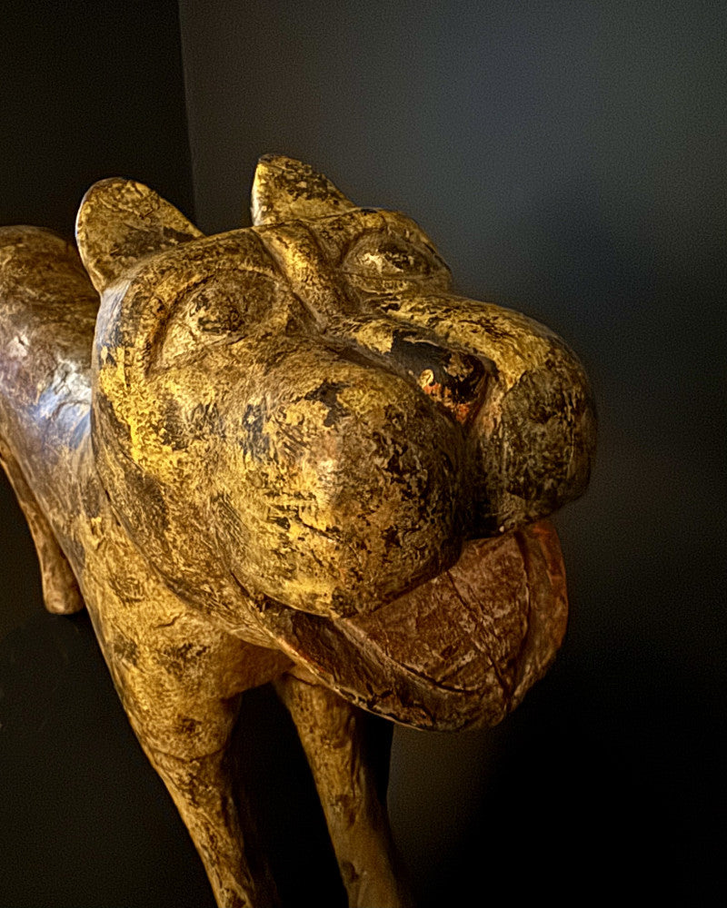 Wooden leopard statue